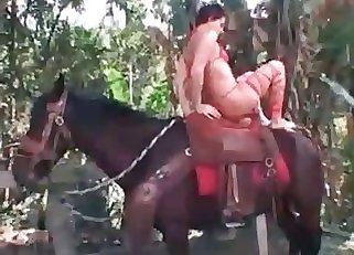 Horny lady jockey is using her stallion for all sorts of fun