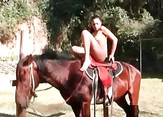 Slender woman unwraps her clothes and demonstrates off her body for a pony