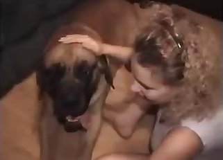 Skirt-wearing Cougar is about to fuck a dog