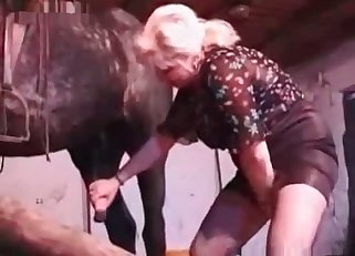 Fat blonde MILF seducing a kinky horse
